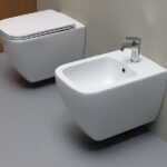 Vaso Senza Brida & Bidet Sospesi Scarico 3.5/4 lt - Area
